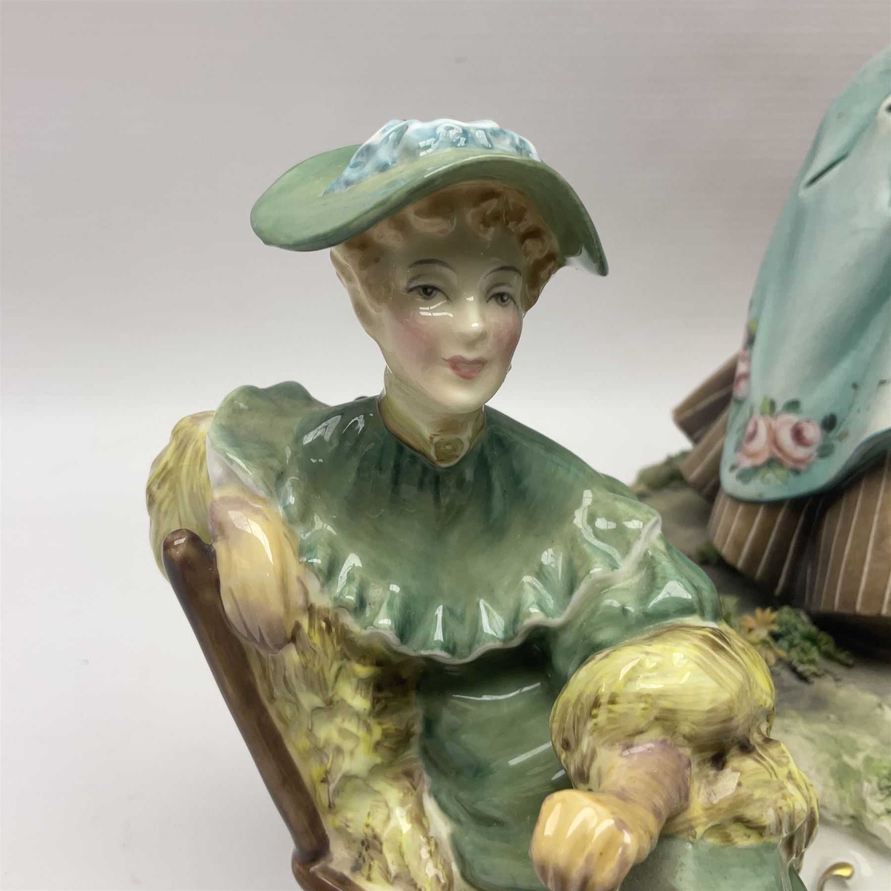 Two Royal Doulton figures, Buttercup HN2309 and Ascot HN2356, together with Capodimonte figure Hussar and His Lady 