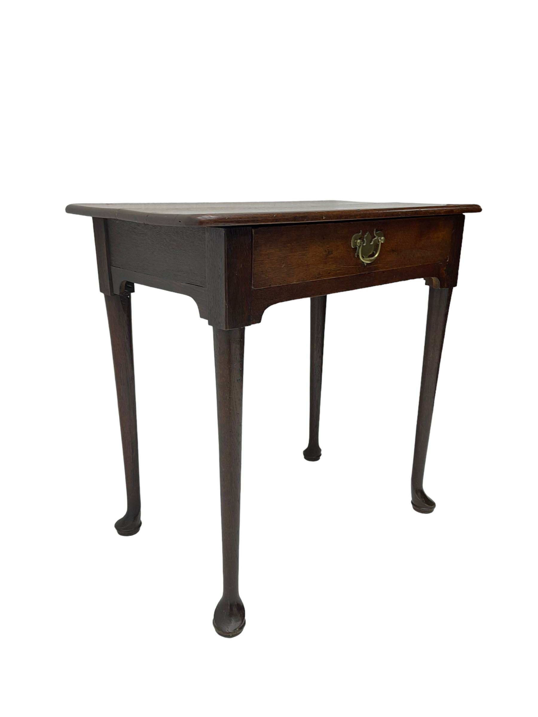 George III oak low boy, fitted with single drawer, raised on tapered supports with pad feet