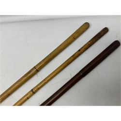 WW2 copper and brass bugle inscribed George Potter & Co, Aldershot 1939 L28cm; two cane and one leather covered swagger sticks; and three small pairs of plain brass shell cases (10)