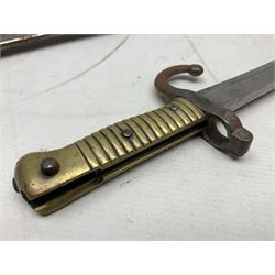 French model 1866 sabre bayonet, the 57.5cm curving blade marked St. Etienne 1873; in associated steel scabbard L71cm; and Mosin-Nagant M1891 socket bayonet with 43cm cruciform blade No.37068 (no scabbard) (2)