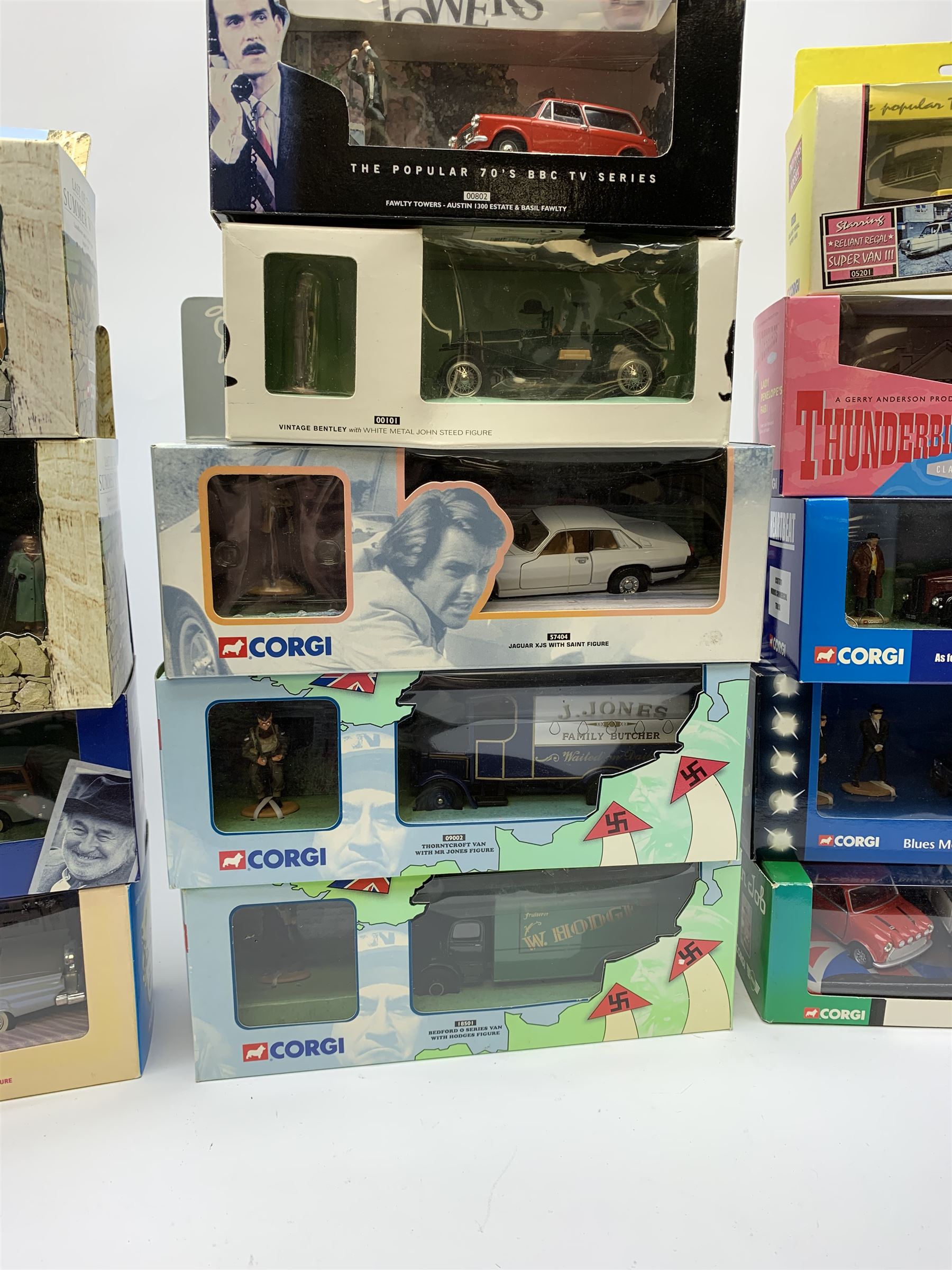 Eighteen Corgi die-cast models of TV & film interest including Dad's Army (2), Last of the Summer Wine (2), Heartbeat (2), Blues Brothers, Bullitt, Marilyn Monroe, Return of the Saint, Thunderbirds FAB1, The Avengers etc; all mint and boxed (18)