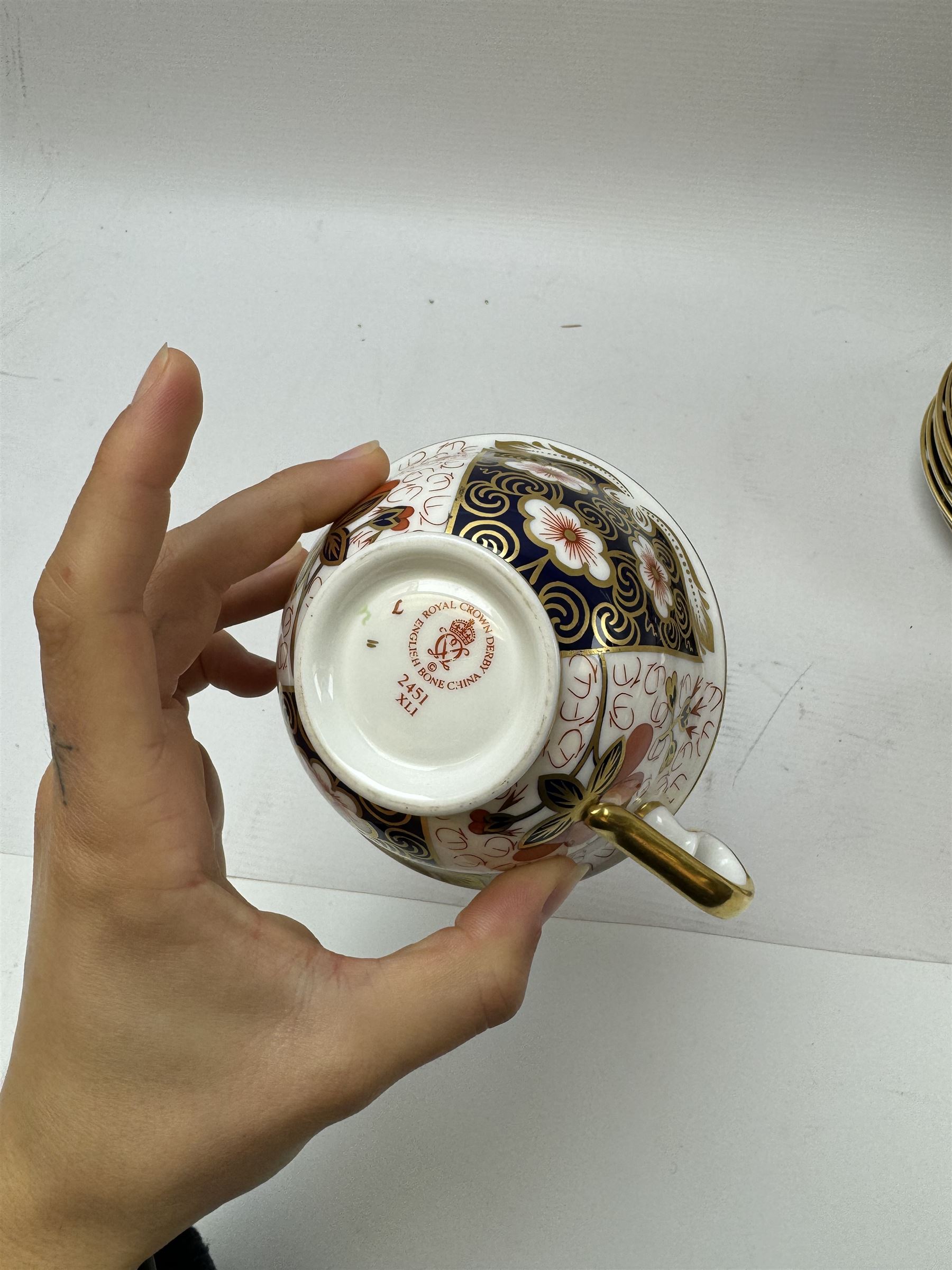 Royal Crown Derby Imari pattern 2451, four teacups, six saucers, six dessert plates etc 
