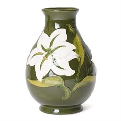 Moorcroft Fuchsia pattern table lamp, impressed marks to base, excluding fittings H32cm; together with a Bermuda Lily pattern vase, impressed marks and signed to base, H19cm (2)