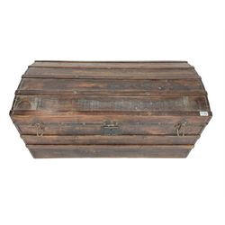 Late 19th century stained pine trunk, hinged dome top with wrought metal fittings and lock