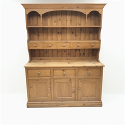  Solid pine farmhouse dresser, two tier plate rack with five short drawers above three long drawers and three cupboards, plinth base, W158cm, H201cm, D52cm  