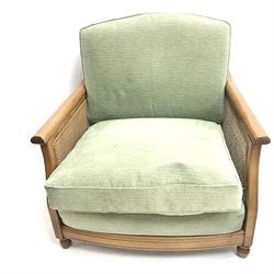 Ercol elm Bergere three seat sofa, Golden Dawn finish (W185cm) and matching armchair (W91cm)