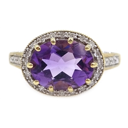  9ct gold (tested) oval amethyst and diamond ring  