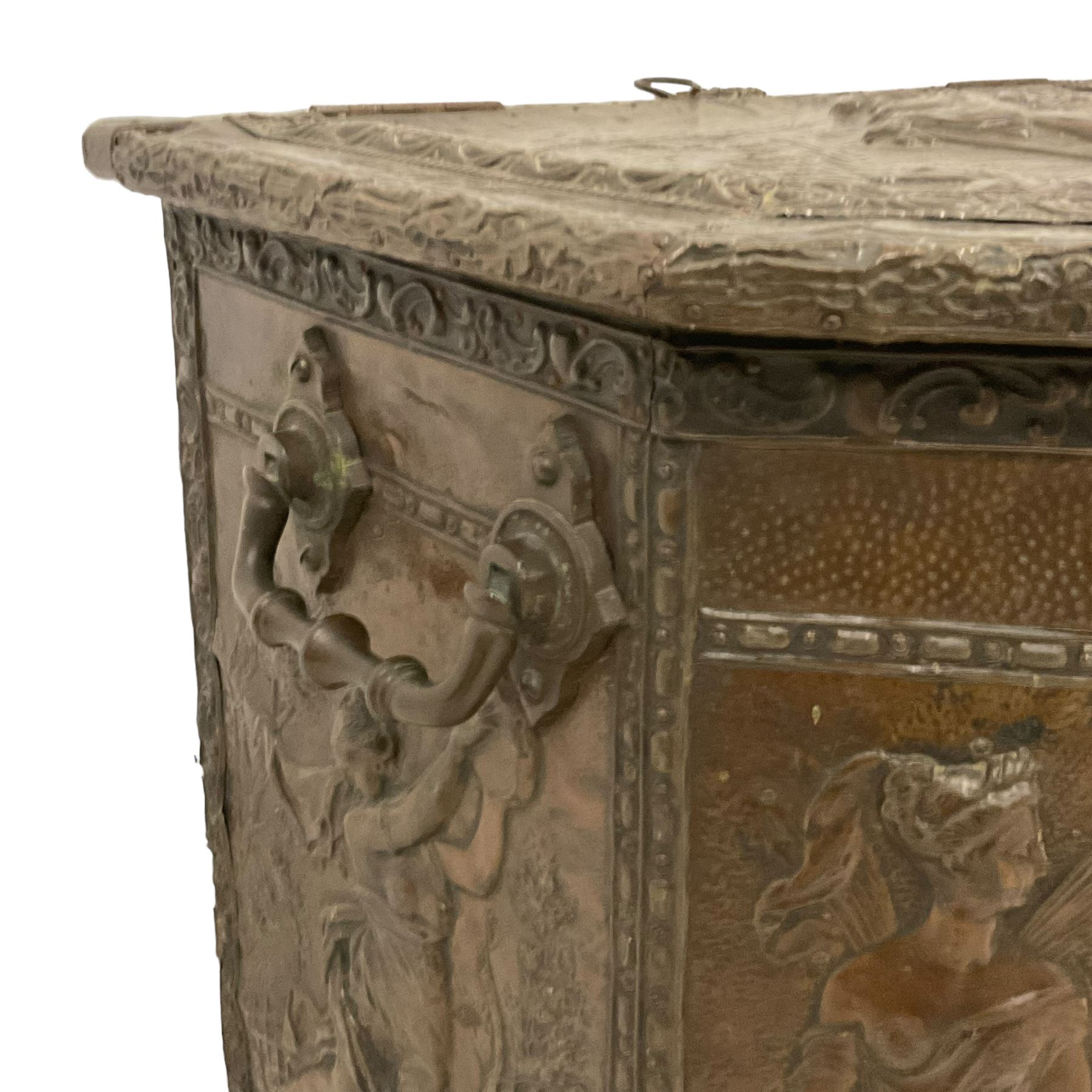 Large 19th century wooden and brass repousse coal box, rectangular form with canted front, enclosed by hinged lid decorated with figural countryside scene, the front panel depicting tavern scene at the 'Scours Contre la Soif' and initialled 'Ete', the remaining panels decorated with mythical scenes, with metal lining and hinged carrying handles, on castors

