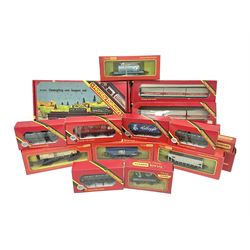 Hornby/Tri-Ang ‘00’ gauge - fifteen goods wagons to include freightliners with containers, ore wagons, closed vans etc; together with R404 Operating ore wagon set; all boxed (16) 