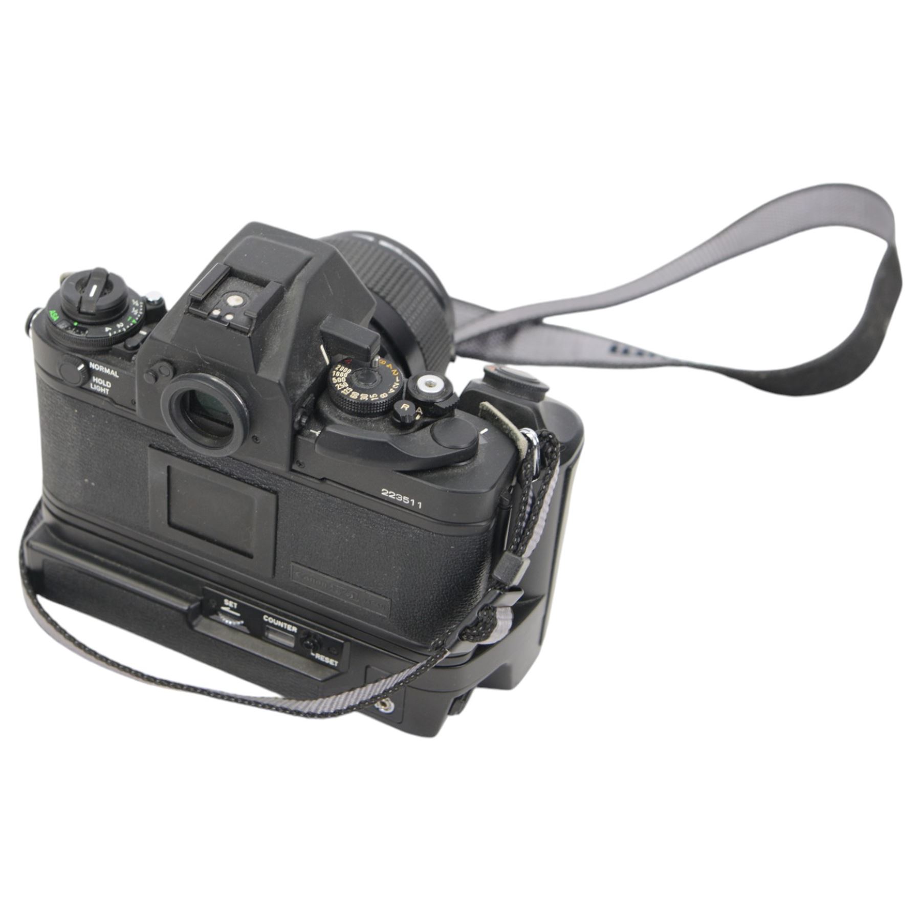 Canon F1 camera body, serial no. 223511, with 'Canon FD 35mm 1:2 FD' lens, serial no.23164, shoulder strap and Canon AE Power winder, serial no.174705