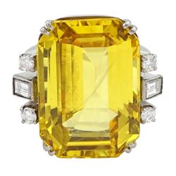 Palladium natural yellow sapphire ring, set with three baguette and round cut diamonds either side, sapphire approx 28.00 carat, with The Gem & Pearl Laboratory report stating no evidence of heat treatment, origin opinion Sri Lanka, colour transparent yellow