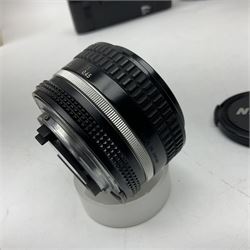 Nikon F3T camera body, in champagne/ titanium colourway, serial no. T8215031, with 'Nikon Nikkor 50mm 1:1.4' lens, Nikon MD4 motor drive, serial no. 156592 and Nikon MK-1 Firing range converter, all with original boxes 