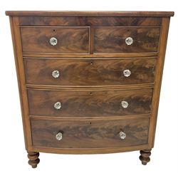 Victorian mahogany bow front chest, fitted with two short over three long graduating cock-beaded drawers, each with glass handles, raised on turned feet