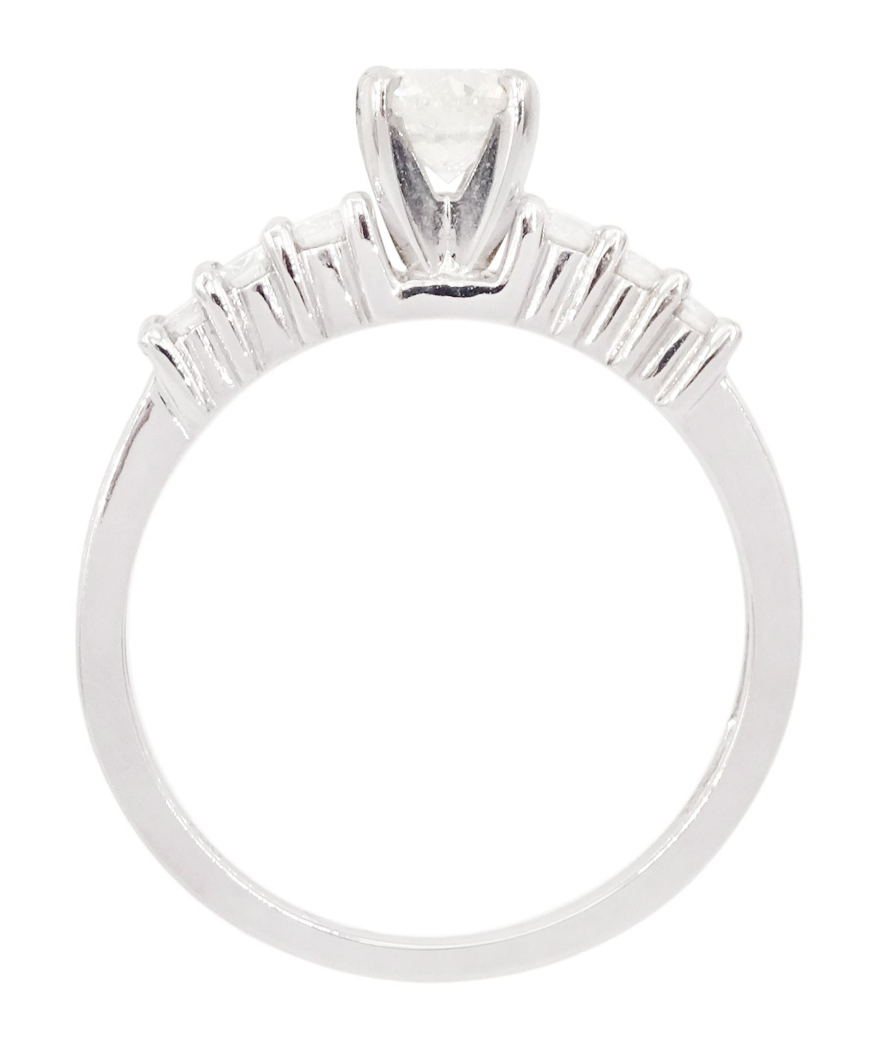 18ct white gold diamond ring, single stone round brilliant cut diamond of approx 0.50 carat, with diamond set shoulders, stamped 750