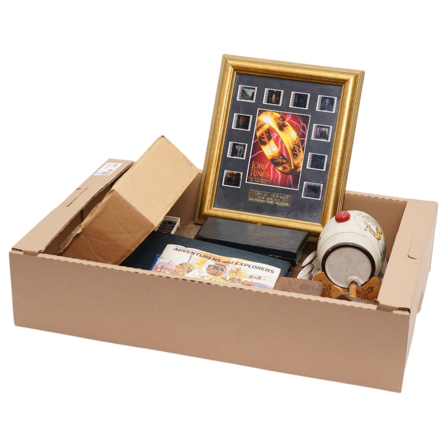 Case of dentist implements, cigarette card album, various loose cards, cigarette dispenser, die cast model vehicles, Lord of the Rings film cell montage etc