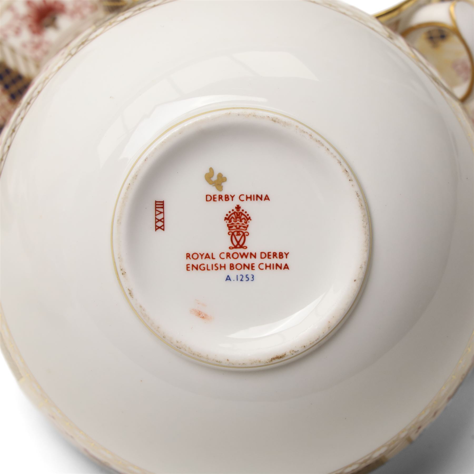 Royal Crown Derby 'Derby Border' pattern part tea service, comprising twelve teacups and saucers, twelve side plates, sandwich plate, milk jug and sugar bowl