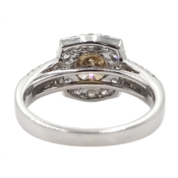 18ct white gold round brilliant cut fancy light brown diamond ring, with halo diamond surround and diamond set shoulders, stamped 750 18K, central diamond 2.00 carat, total white diamond weight 0.90ct