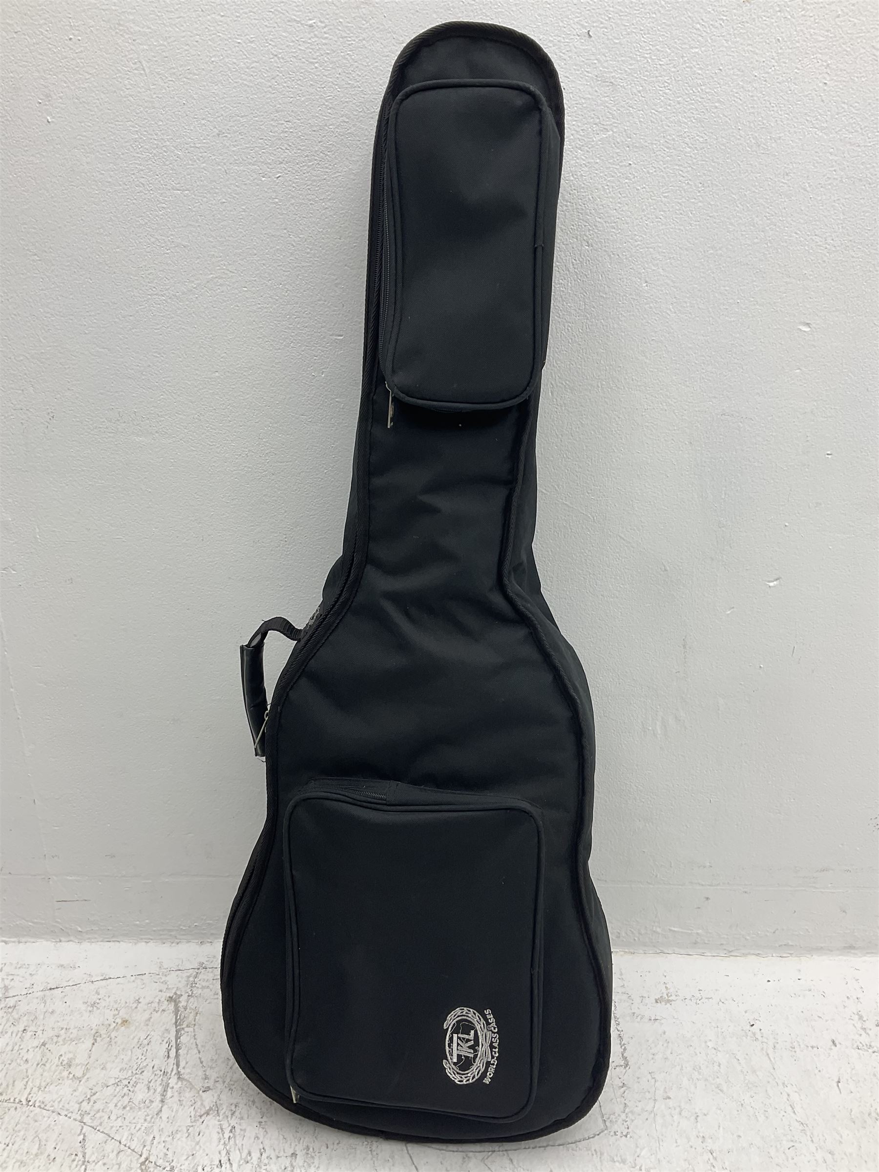 Nagoya Suzuki Model SC240 acoustic guitar with mahogany back and ribs and spruce top, bears label, L101cm; in soft carrying case