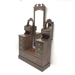 Edwardian walnut drop centre dressing chest with central cheval mirror, nine graduating drawers, platform base, W115cm, H196cm, D46cm