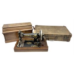Singer hand sewing machine, together with a vintage suitcase, etc 