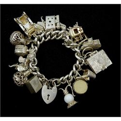 Silver curb link bracelet, with heart locket clasp and twenty-one silver charms including horse, poodle, rose flower, heart ring box, classic car, British Passport, lighter, camera, drum and champagne bottle in bucket