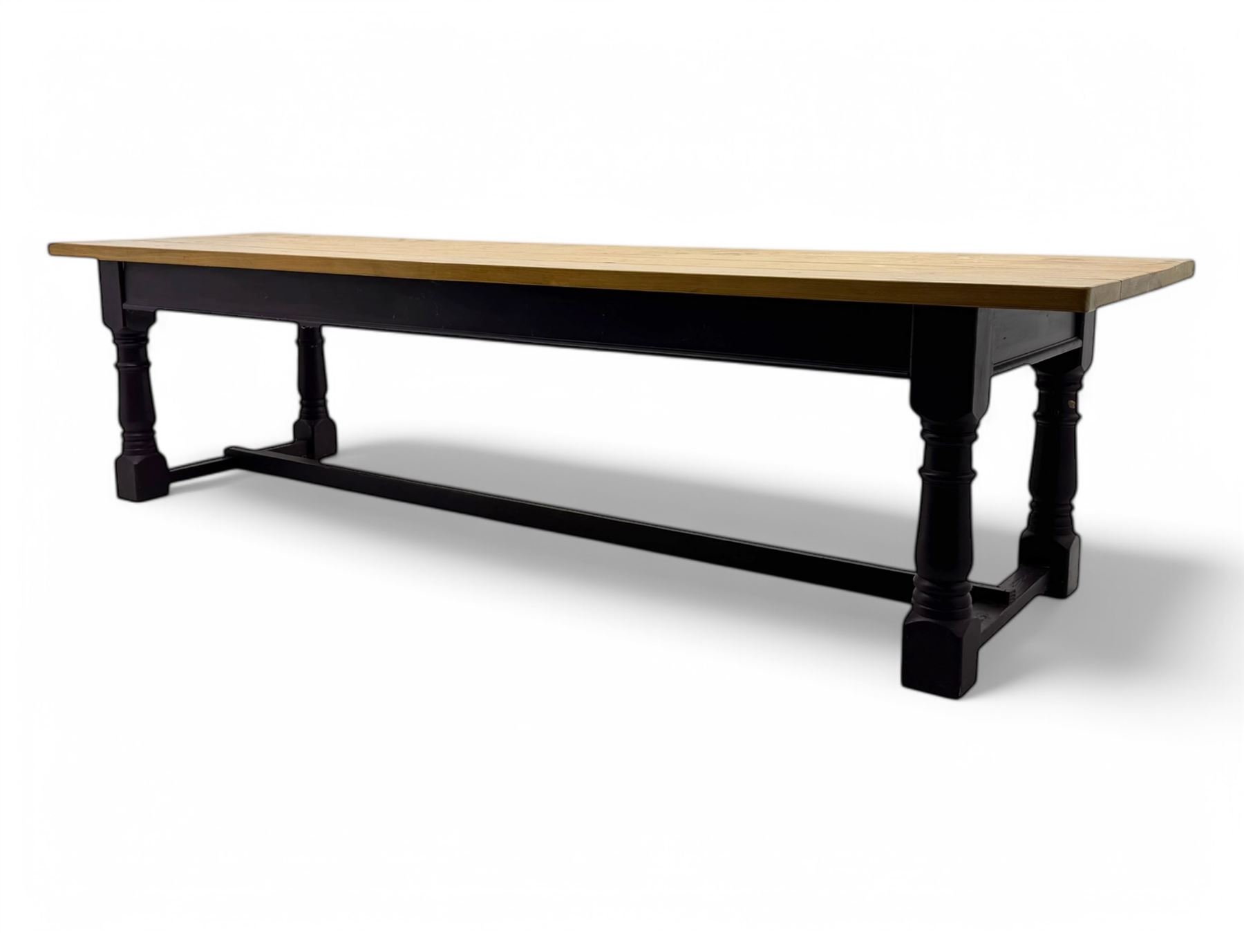 Late 20th century substantial pine refectory table, rectangular four-plank top over an indigo painted base featuring turned supports united by box stretchers