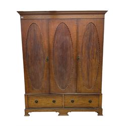Edwardian panelled mahogany triple wardrobe, matching chest and dressing chest and bedside cupboard (4)