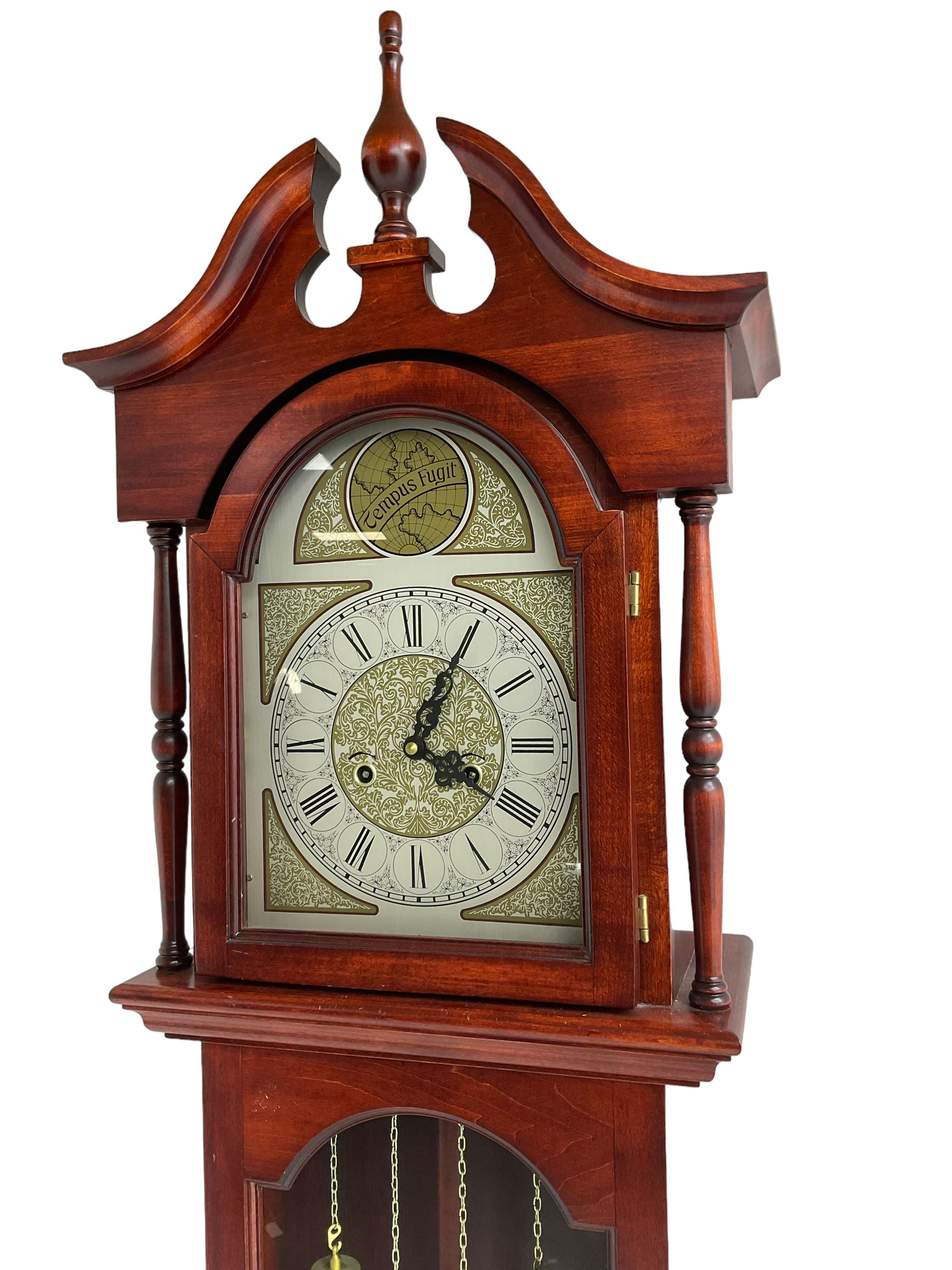 Late 20th century - Mahogany cased spring driven longcase clock, with an etched brass and silvered dial and pierced steel hands, fully glazed trunk door with visible pendulum and dummy weights, striking the hours and half hours on a gong.