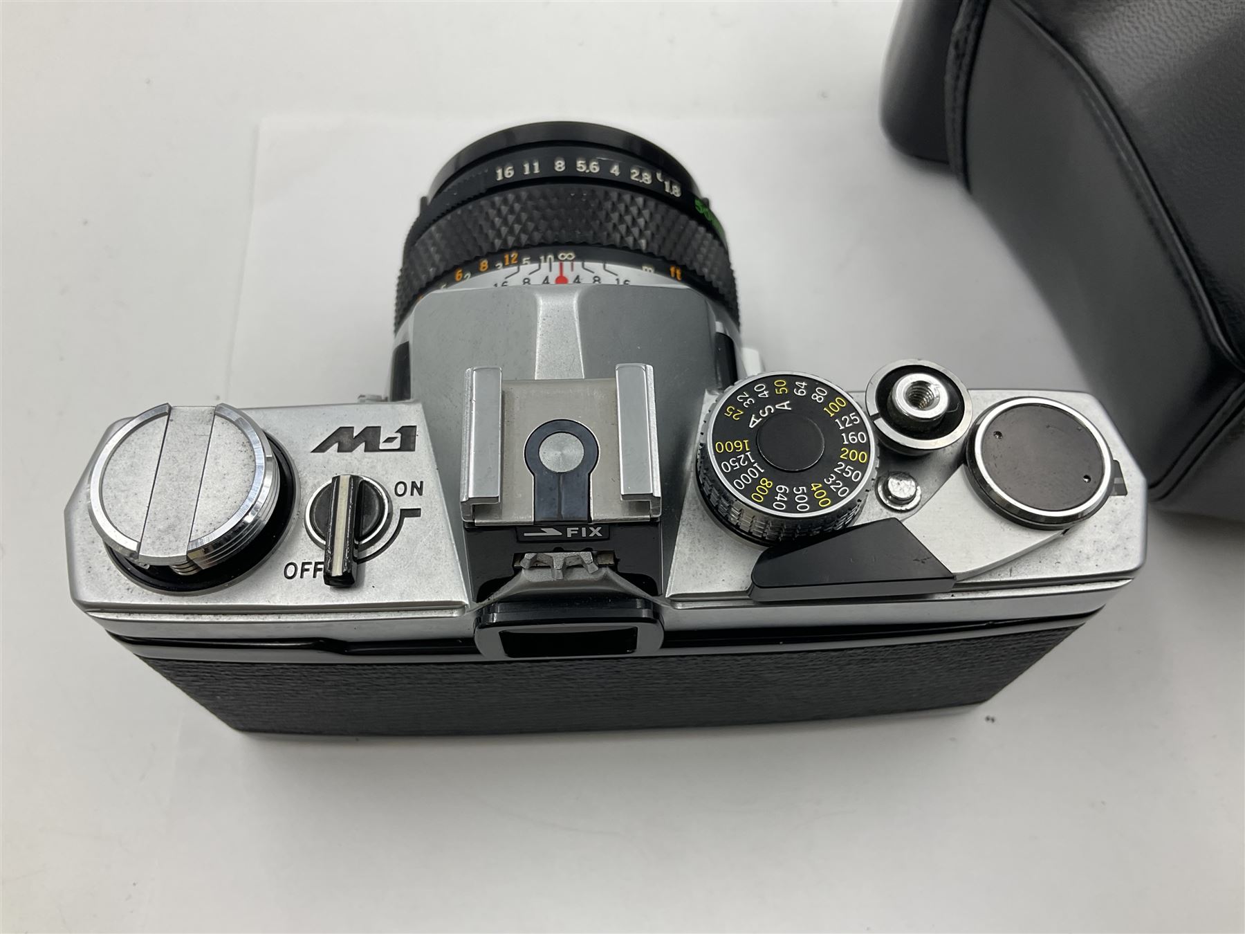 Olympus M-1 camera body, serial no. 110865, circa 1972, with ' Olympus M-System F.Zuiko Auto-S 1:1.8 f=50mm' lens, serial no. 105152, in leather case 