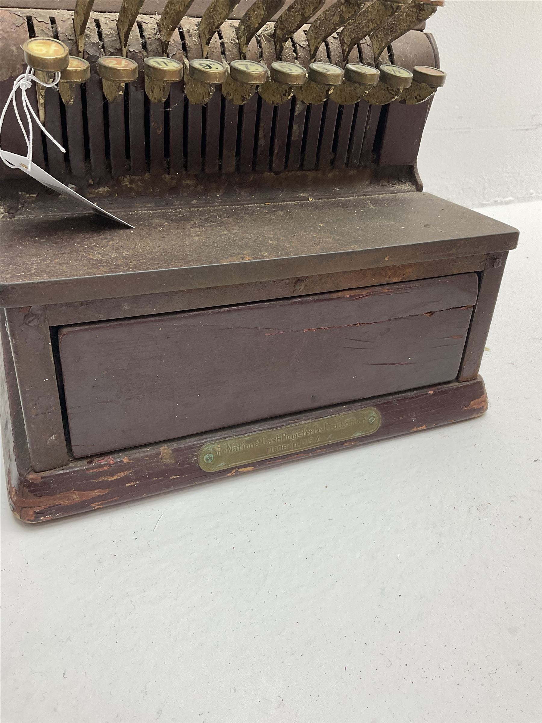 An Antique cash register, made by The National Cash register Co, Ltd. London, H43. 