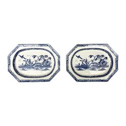 Pair of early 19th Century blue and white transfer plates by Turner, of elongated rectangular form decorated with a river scene of a figure in a fishing boat and another figure walking over a bridge between two pagodas amongst blossoming trees, surrounded by foliate borders, both impressed 'Turner' marks beneath, L27.5cm