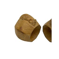 'Mouseman' four oak napkin rings, of bulbous octagonal form each carved with mouse signature, by Robert Mouseman Thompson of Kilburn 