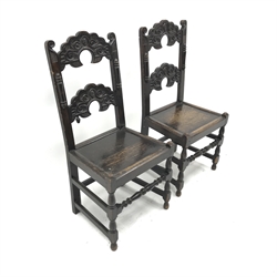 Pair 19th century Yorkshire/Derbyshire type oak hall chairs, detailed carved backs, solid seats, W50cm (2)