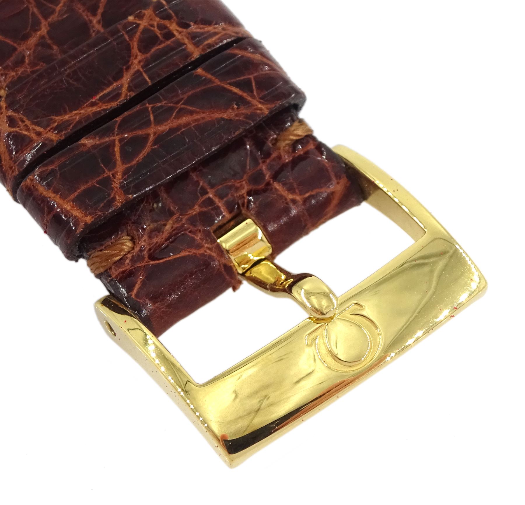 Omega De Ville gentleman's 18ct gold quartz presentation wristwatch, Ref. 73201412, champagne dial with date aperture, on original brown leather strap with gilt buckle, box with warranty card dated 2004