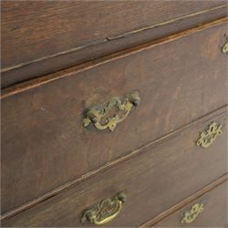 18th century oak chest, rectangular top with moulded edge, fitted with five drawers and baize line slide, with swan neck brass handles, raised on bracket feet