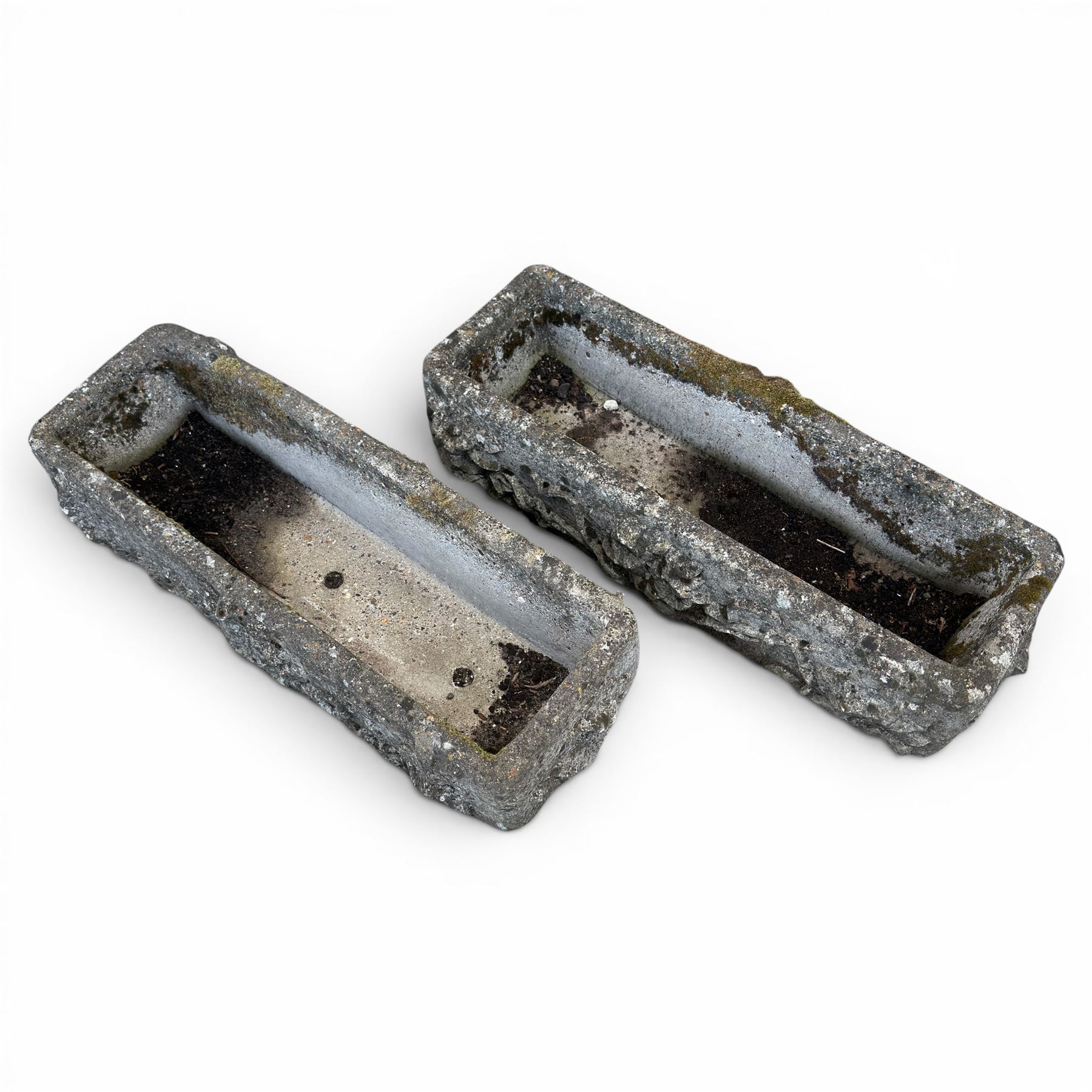Pair of rectangular weathered cast stone planters, ornate moulded detail