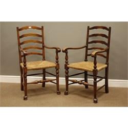  Pair 20th century oak ladder back dining chairs with rush seats  