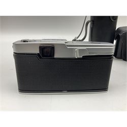 Olympus Pen FV camera body, serial no. 120981, with 'Olympus F.Zuiko Auto-S 1:1.8 f=38mm' lens, serial no. 251523, 'Olympus Zuiko Auto-zoom1:3.5 f=50-90mm, serial no. 135752 and clip on shoe