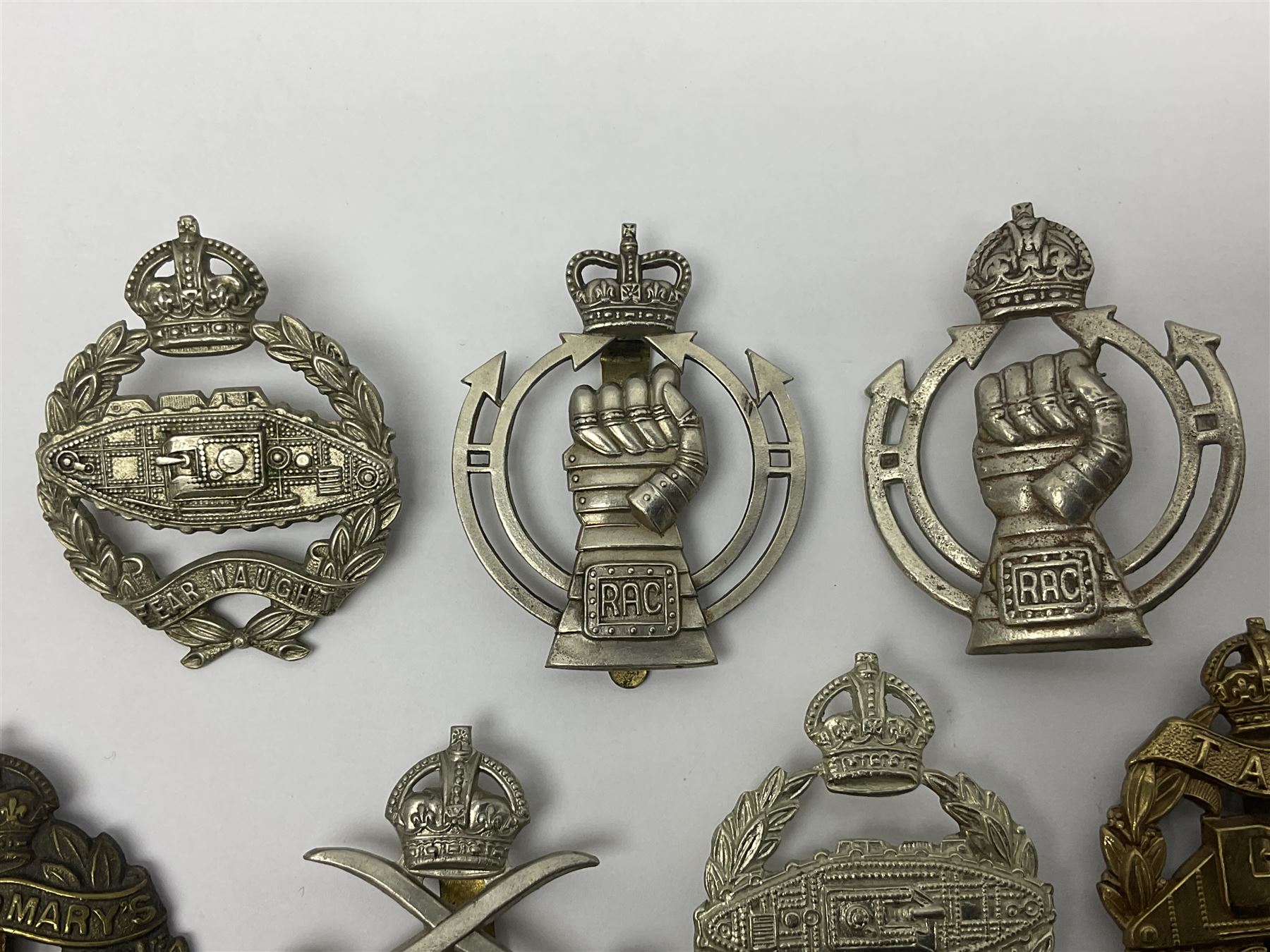 Twenty-seven military metal cap badges including Royal tank Corps, Reconnaissance Corps, Royal Armoured Corps, Royal Corps of Signals, Womens Army Auxiliary Corps, Queen Mary's Army Auxiliary Corps, Auxiliary Territorial Service,  Royal Engineers, REME, Army physical Training Corps etc 