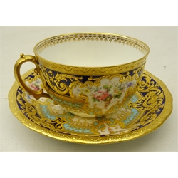  Royal Crown Derby breakfast cup and saucer from the Judge Elbert Henry Gary service, circa 1910, hand painted by Albert Gregory, signed, with baskets of flowers in cartouche shaped panels on cobalt blue and turquoise ground with raised gilded border incorporating an oval medallion with the initial 'G' by George Darlington, signed, printed back stamp in gilt with Royal Warrant and Tiffany & Co retailer's mark, saucer D16cm cup D10cm (2) Provenance Property of Bob Heath, Brandesburton Formerly of Ravenfield Hall Farm near Rotherham  