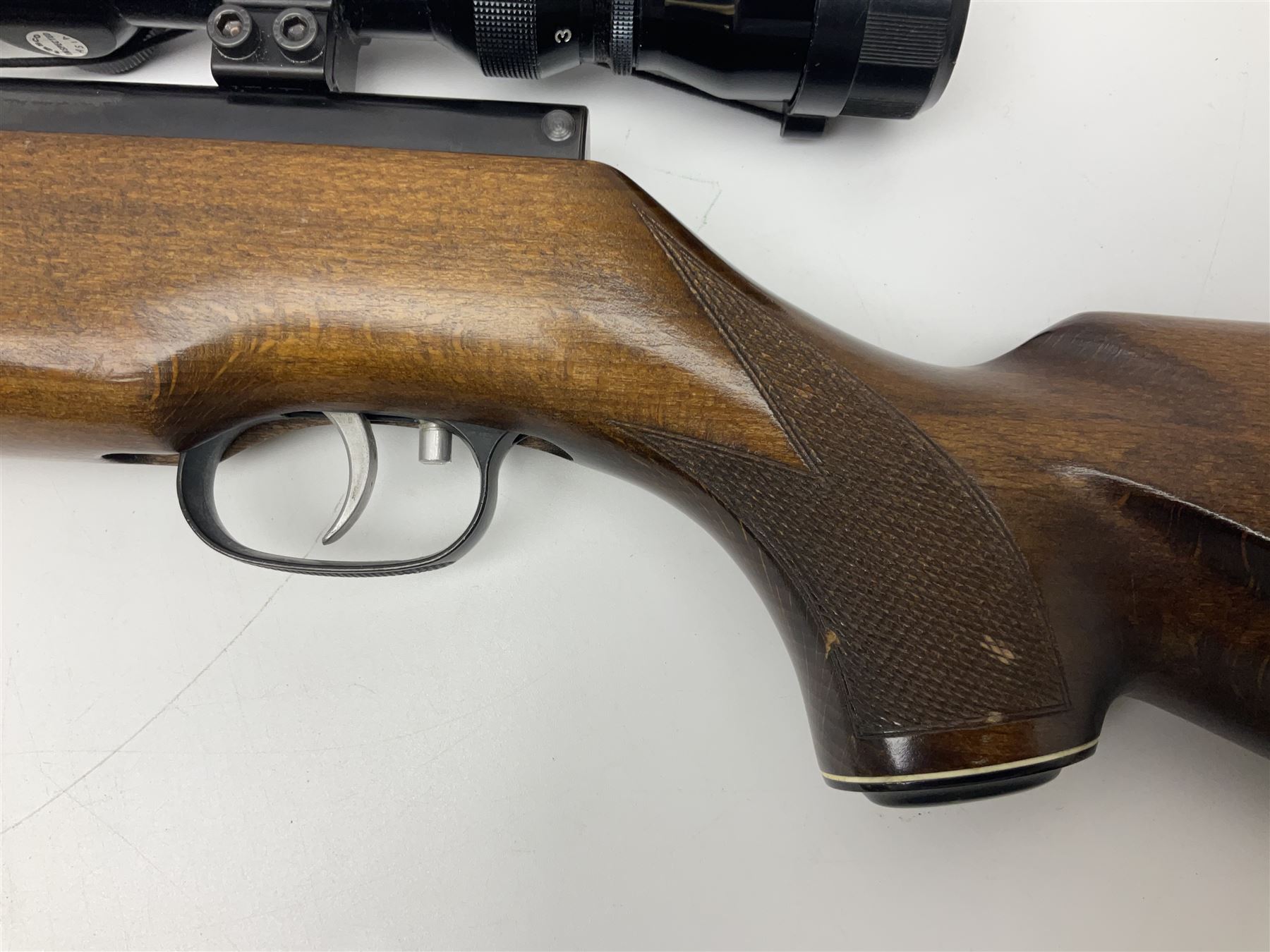 Weihrauch model HW 77 K  .22 air rifle with under lever action, beech stock with chequered pistol grip and Tasco WA39x40-1 scope, serial no.1283661 L102cm overall NB: AGE RESTRICTIONS APPLY TO THE PURCHASE OF THIS LOT