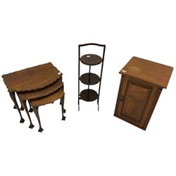 Late Victorian walnut bedside cabinet, nest of three walnut tables with scalloped tops and a three tier folding cake stand 