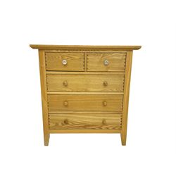 Light oak chest, fitted with two short and three long drawers