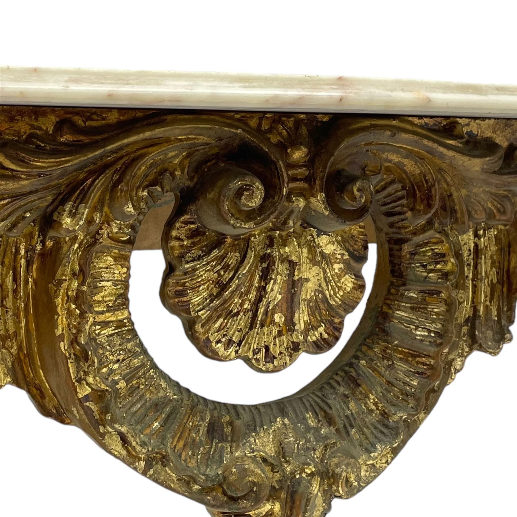 French Rococo design console or pier table, shaped and moulded pale marble top, the apron carved with pierced shell and scrolling acanthus leaves, extending flower head decoration, on four acanthus carved cabriole supports with scrolled terminals, united by shell moulded stretcher rails with central scrolled foliage cartouche 