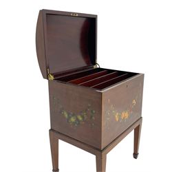 Edwardian mahogany dome-top Canterbury or music cabinet, the lid painted with children in garden scene in floral vignette, the interior fitted with divisions, decorated with floral garlands and rose heads, on square tapering supports with spade feet