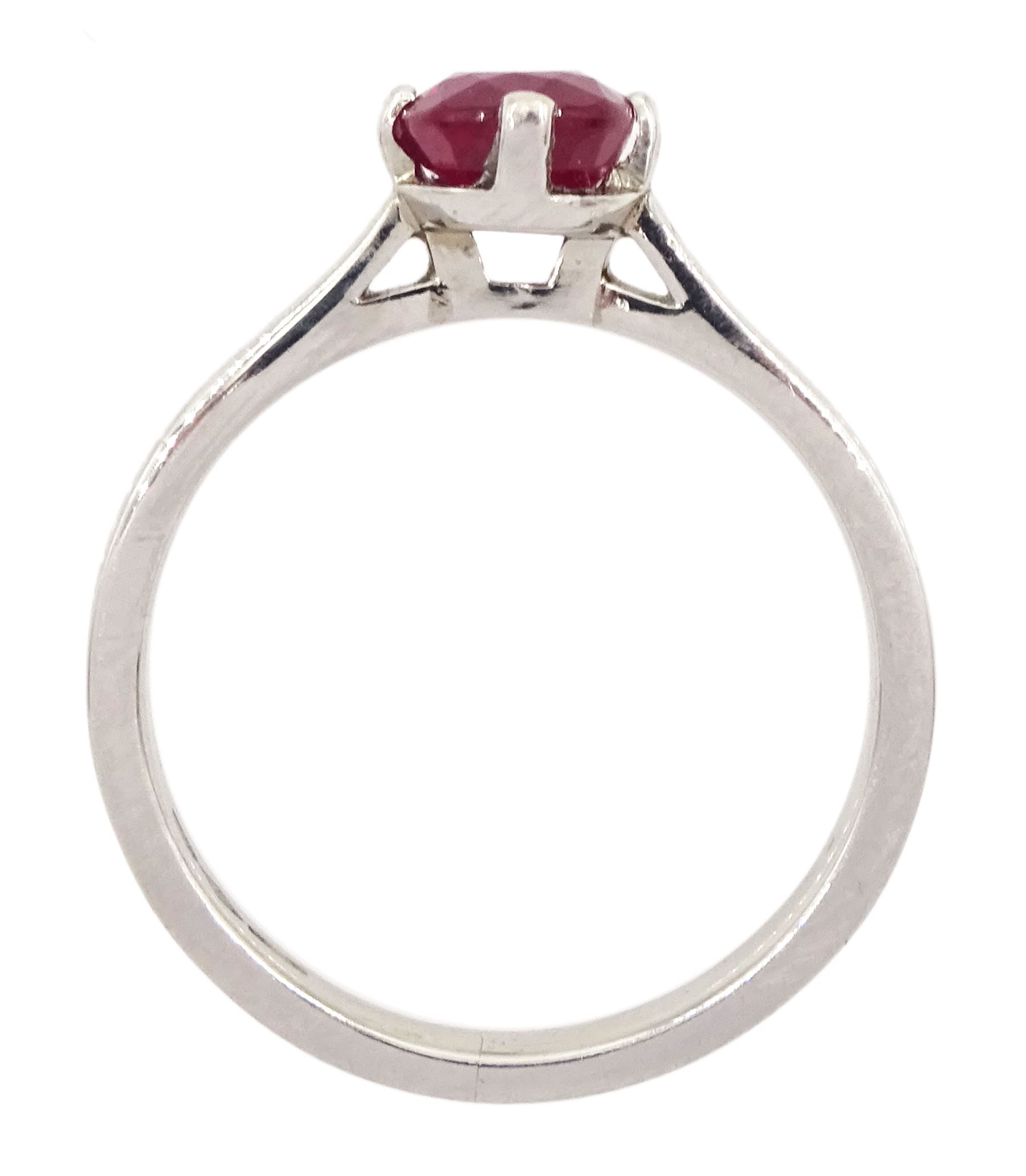 Platinum ruby ring, four claw set with a single oval cut ruby of approx 1.00 carat hallmarked