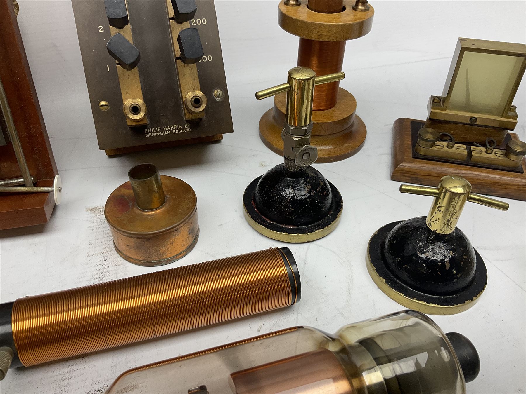 Collection of scientific and technical instruments etc including boxed 'Force on a Conductor' apparatus; vintage GPO resistance box; current deflection meter; vintage X-ray generator tube; small glass electroscope; two demonstrator solenoids; two magdeburg spheres; travelling balance scales etc; some by Philip Harris Ltd
