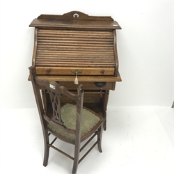  Early 20th Century tambour roll top desk enclosing fitted interior above single drawer, shaped solid end supports (W70cm, H110cm, D47cm) and an Edwardian chair (2)  