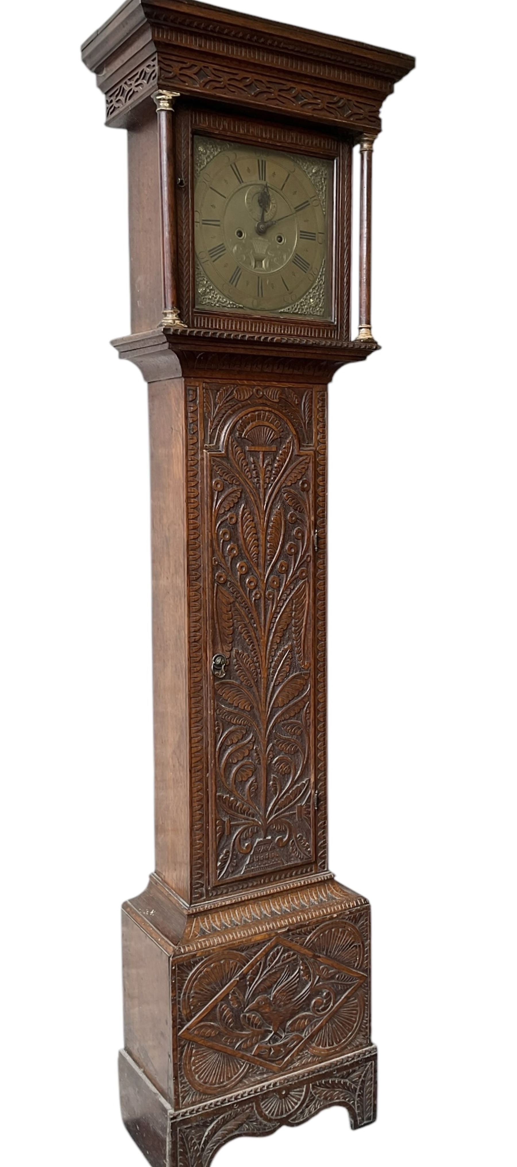 Robert Henderson of Scarborough -mid-18th century eight-day longcase clock c1750, with a flat topped pediment and broad cornice, carved frieze beneath and a square hood door flanked by detached pilasters with gesso capitals, profusely carved trunk with a break arch topped door on a square plinth raised on a shaped base, brass dial with a matted and engraved dial centre, cast spandrels and chapter with Roman numerals and five minute Arabic's, with a seconds dial and date aperture, dial pined directly to a rack striking movement with a recoil anchor escapement, sounding the hours on a bell. With weights and pendulum.
Robert Henderson was one of the first clockmaker recorded as working in Scarborough, b1678-d1756.

