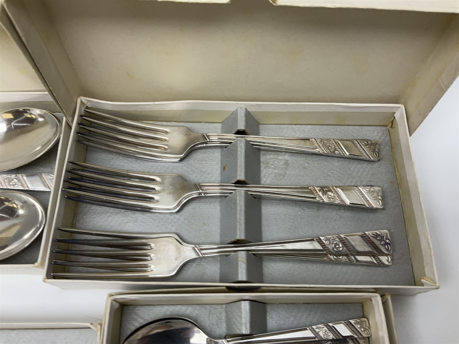 Viners Ltd silver plate Silver Rose pattern cutlery service for six place settings, to include butter knives, table knives and forks, soup spoons, dessert forks and spoons, tea knives, forks and spoons, two serving spoons and a seven piece fruit set, some boxed, missing table spoons